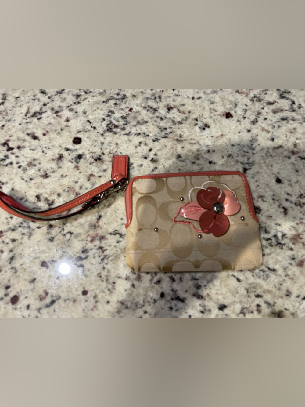 Coach Beige Signature Wristlet with Coral Flower Accent